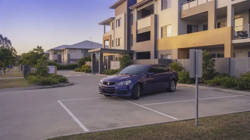 Can a Body Corporate Tow a Car From Visitor Parking in Queensland?