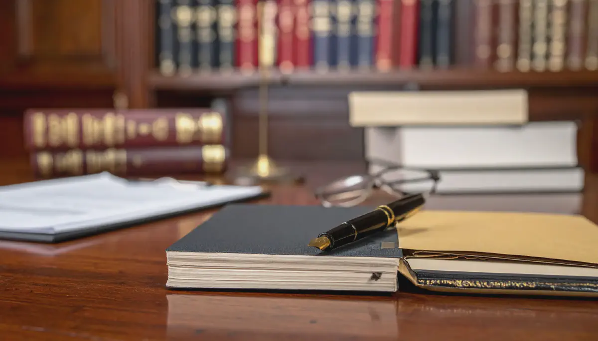 Legal precedent in Rush v Nationwide News represented by case files and spectacles